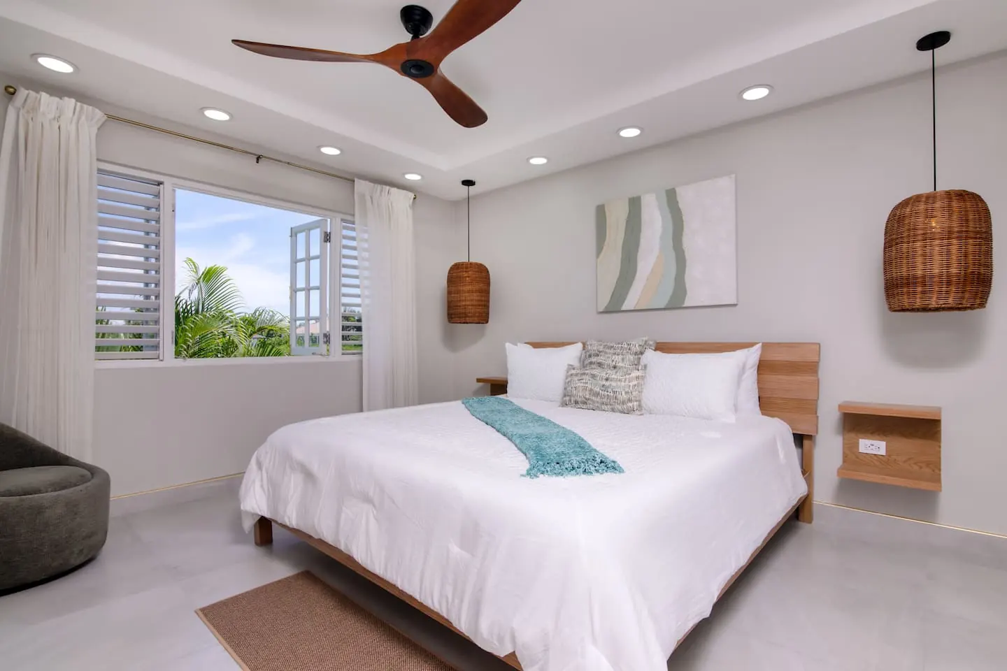 Bedroom 1: one king bed, with views of the lagoon.